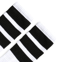 SOCCO Bold Black Striped Socks | White Knee High Socks